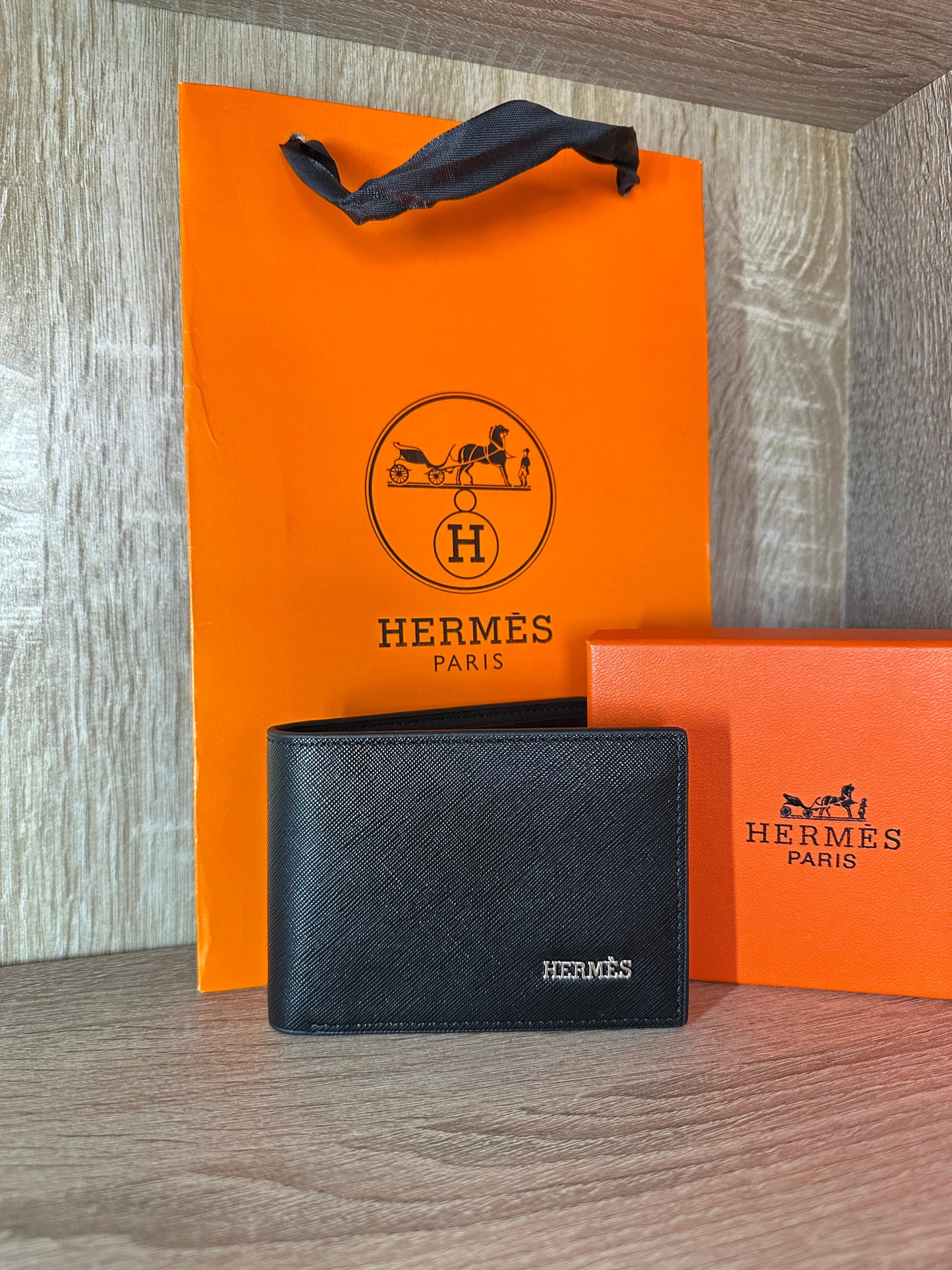 PORTE FEUILLE HERMES NOIR