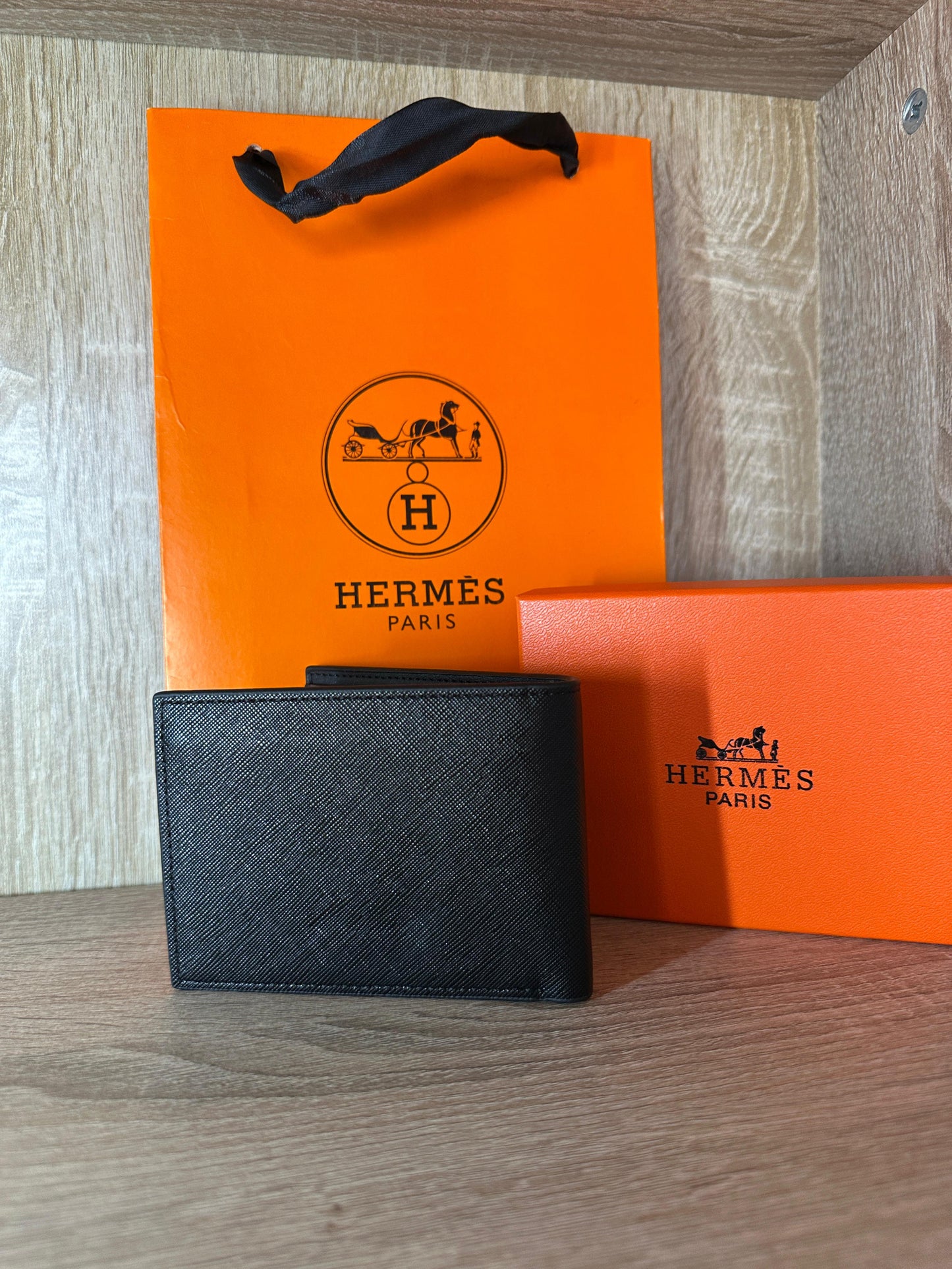 PORTE FEUILLE HERMES NOIR