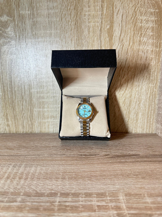 ROLEX GRIS GOLD TABLEAU BLEU CIEL FEMMES BOITE SIMPLE