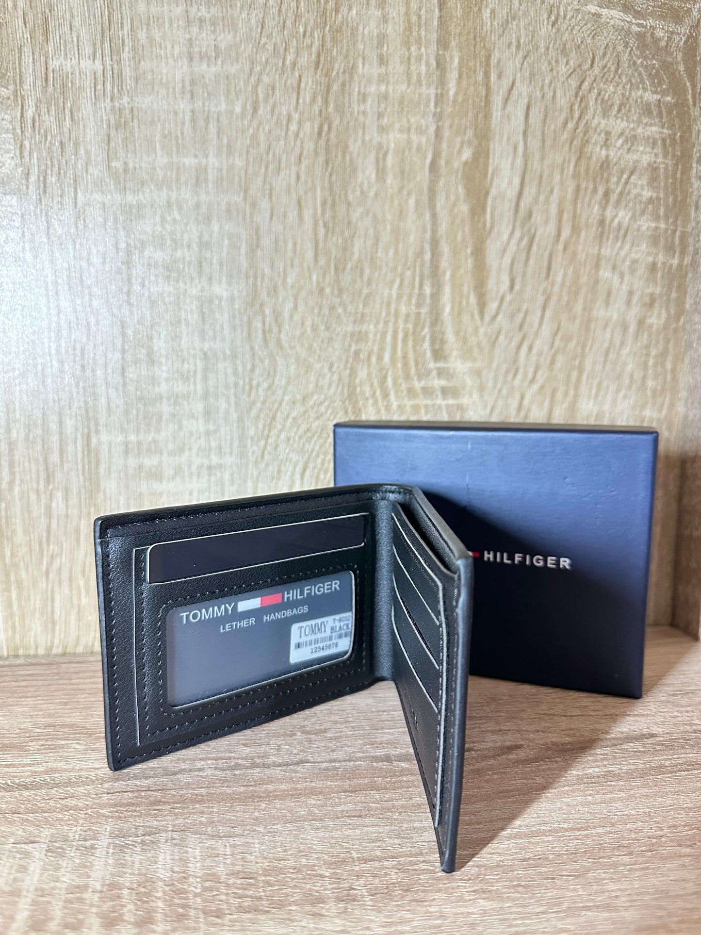 PORTE MONNAIE TOMMY 4 HOMMES