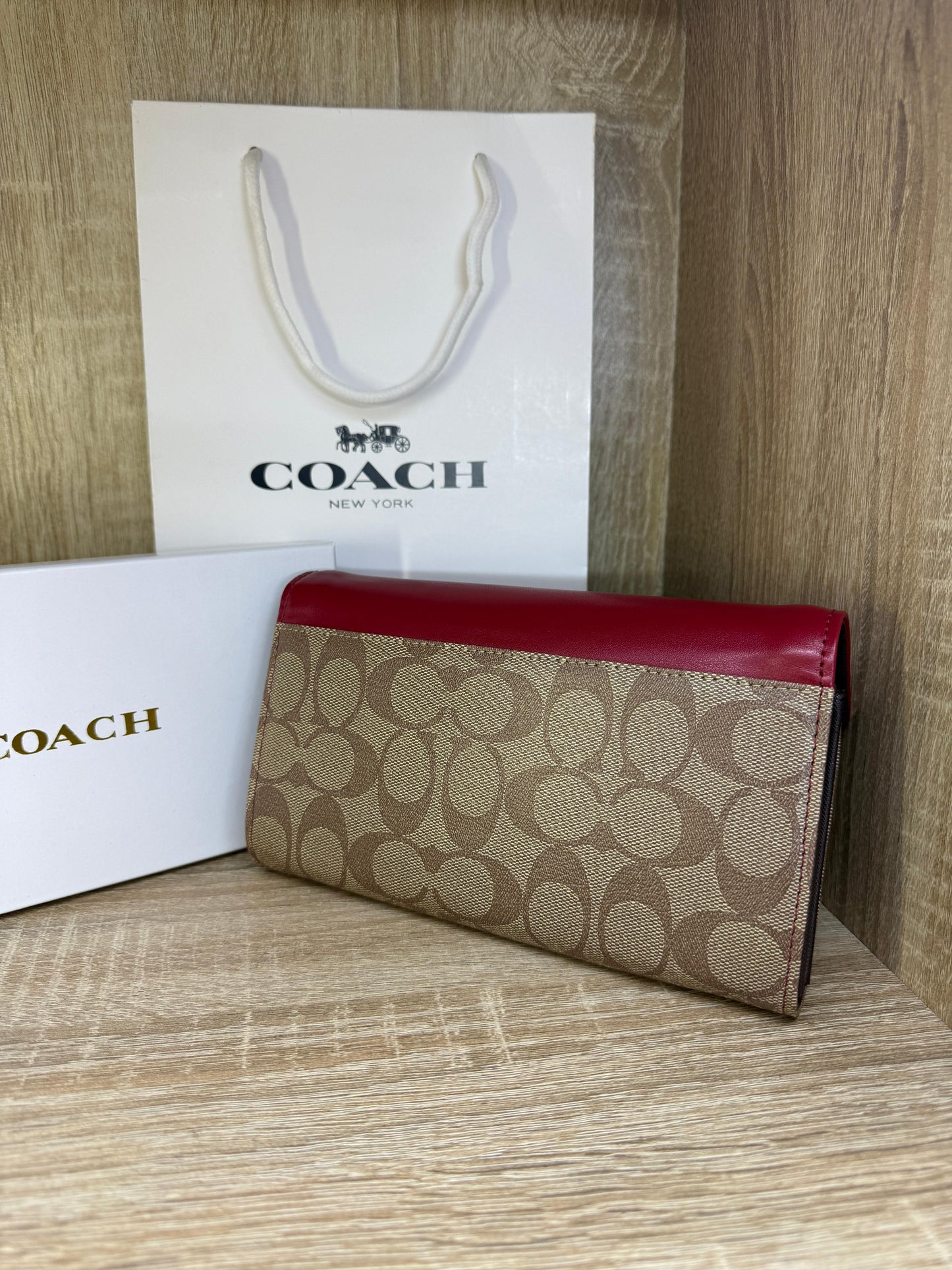 PORTE FEUILLE COACH BORDY FEMMES