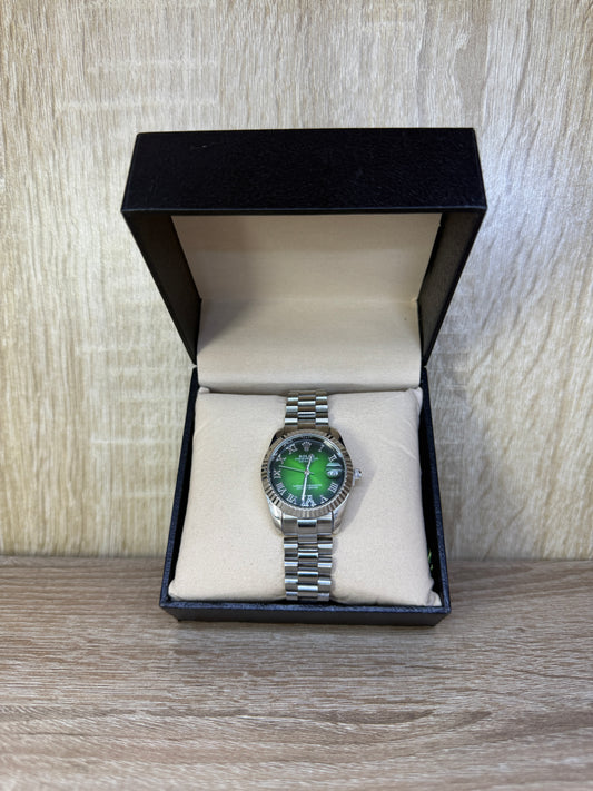 ROLEX FEMMES GRIS TABLEAU VERT CHIFFRE ROMAIN BOITE SIMPLE
