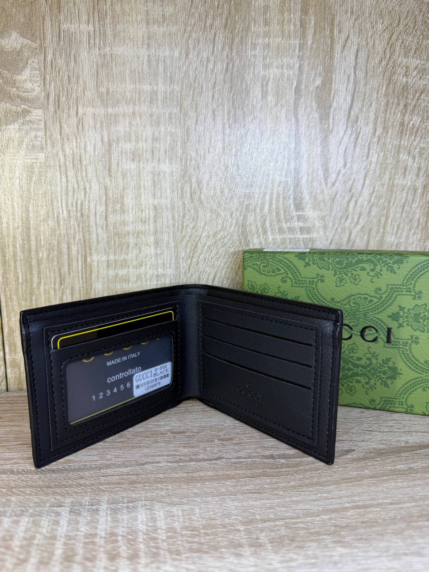 PORTE MONNAIE GUCCI HOMMES 1