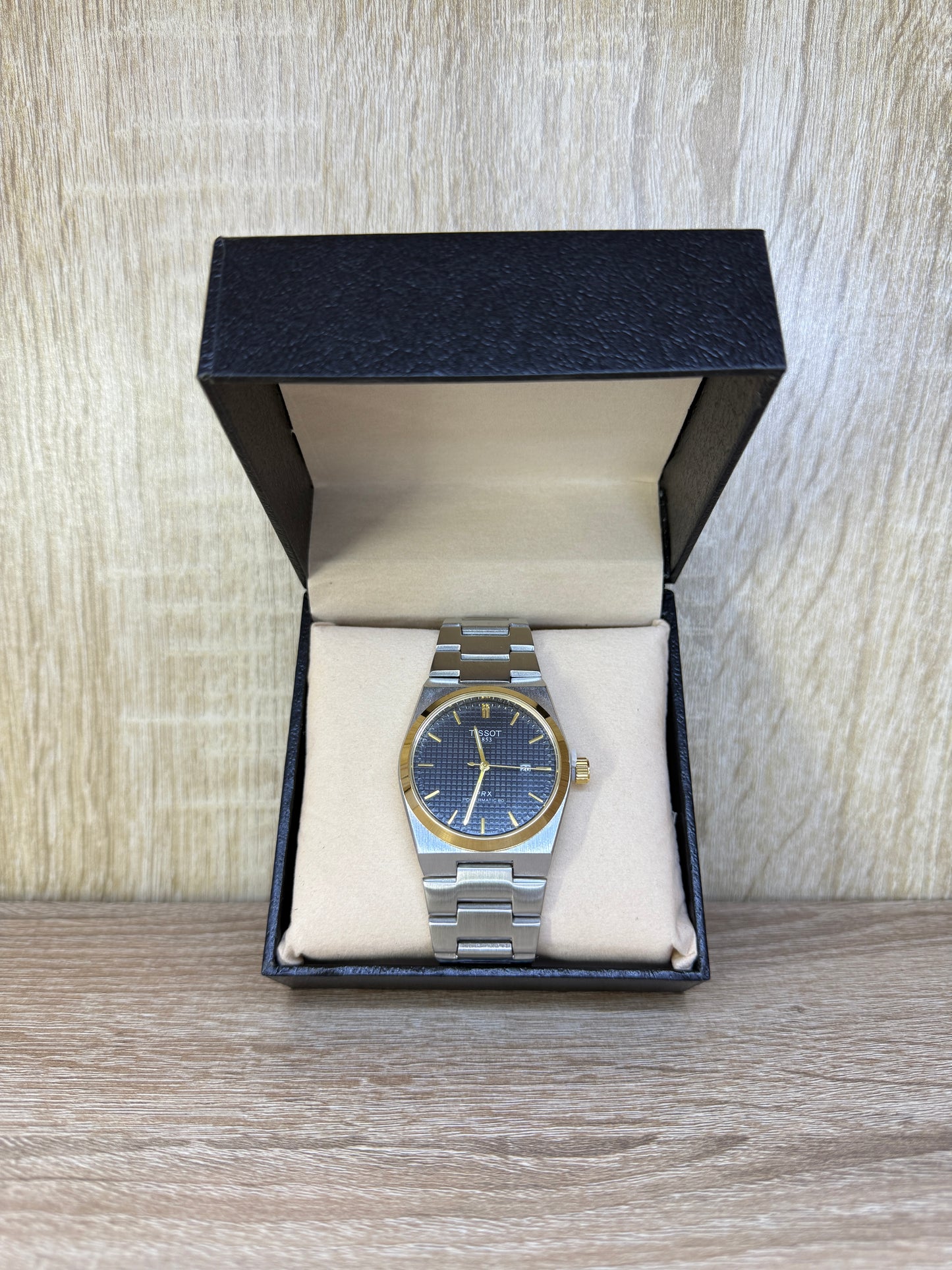 TISSOT HOMMES NOIR/GOLD BOITE SIMPLE