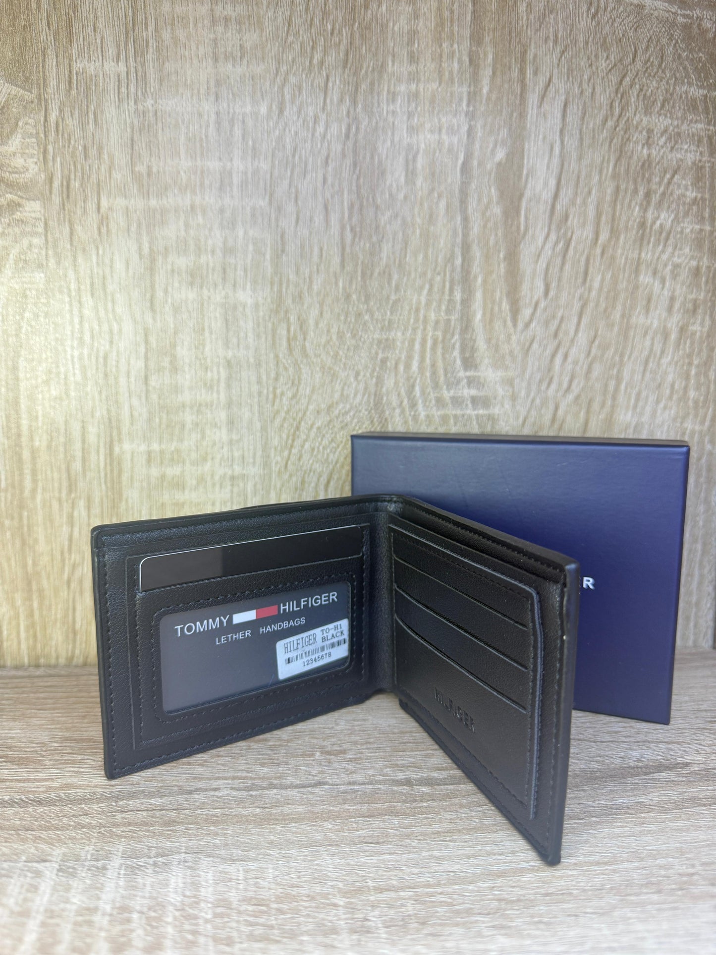 PORTE MONNAIE HOMMES TOMMY 1