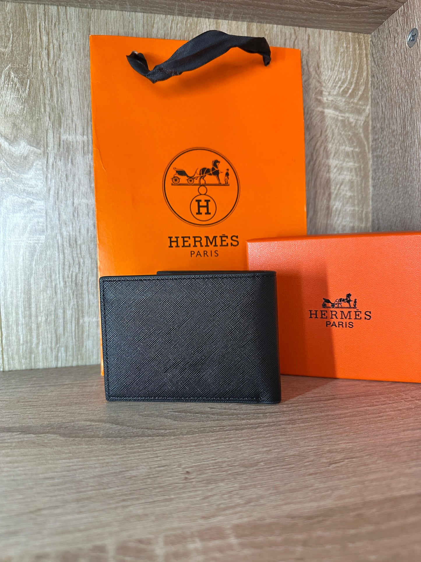 PORTE FEUILLE HERMES NOIR